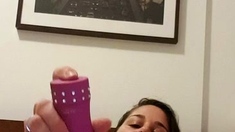 Busty babe playing with her big boobs