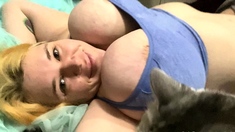 Blonde babe Kagney Karter plays with her big boobs