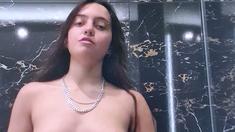 Brunette amateur babe strips off and masturbates