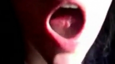 She takes the load in her mouth and swallows it all