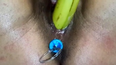 Amateur Milf Squirting fucking a Banana with Anal Beads