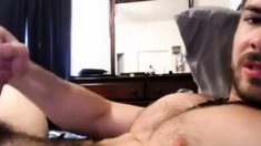 Sexy guy cums on his hairy chest